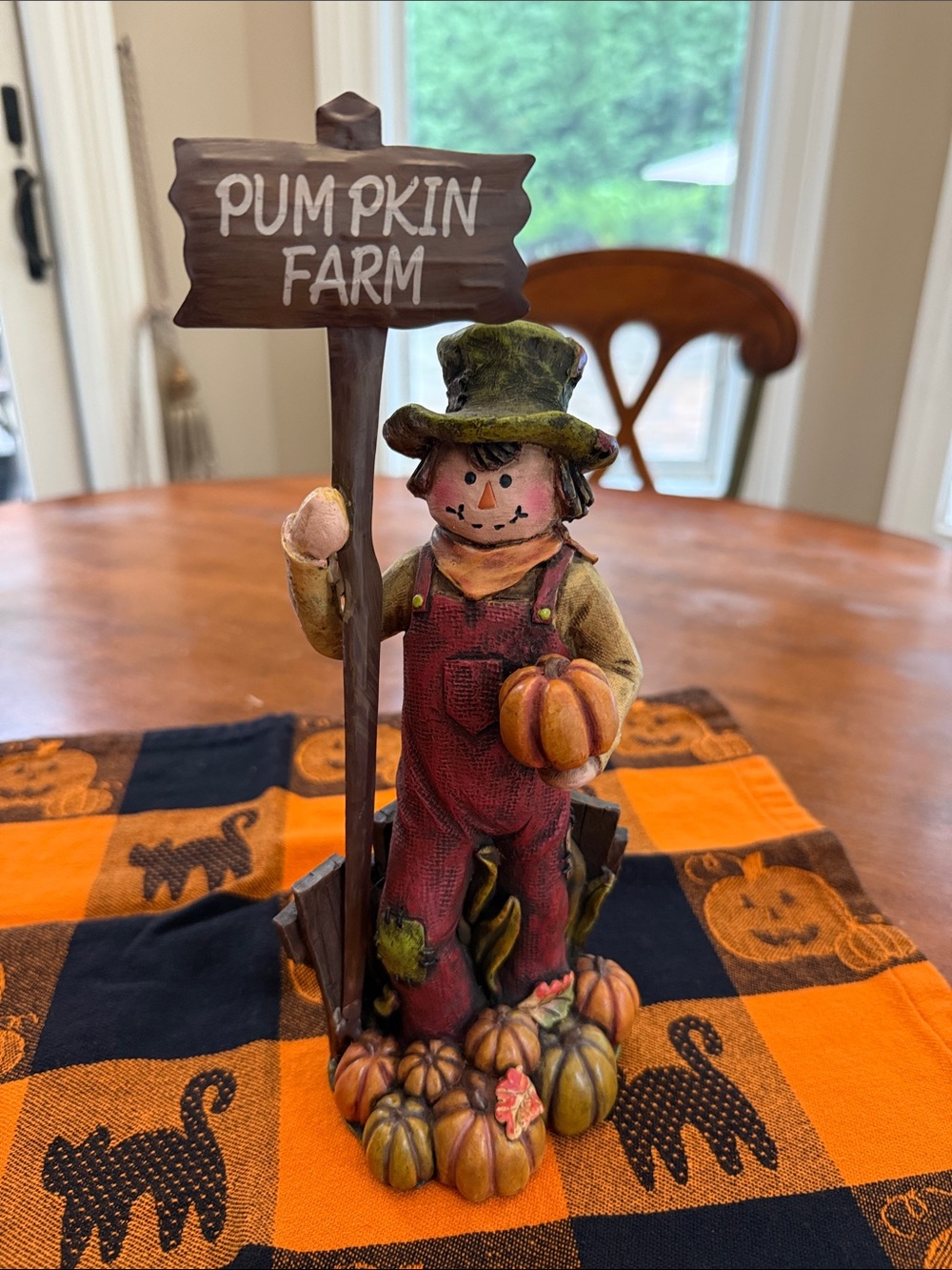 Autumn Scarecrow Halloween Figurine Holding Pumpkin